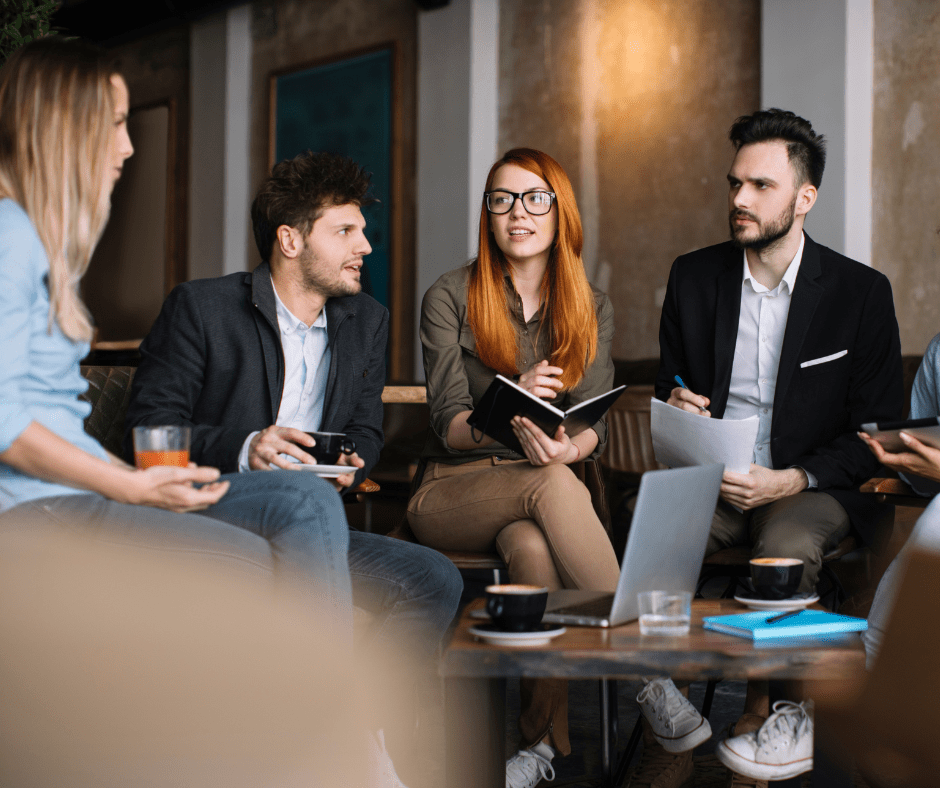 Business people sitting around a table