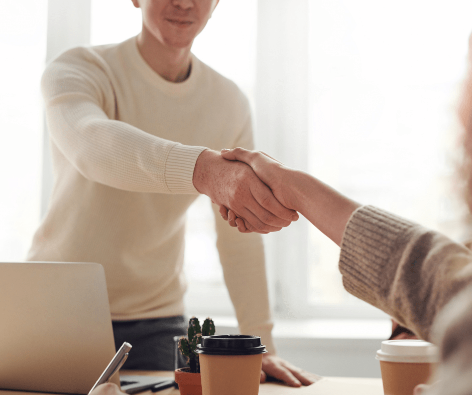 Two people shaking hands